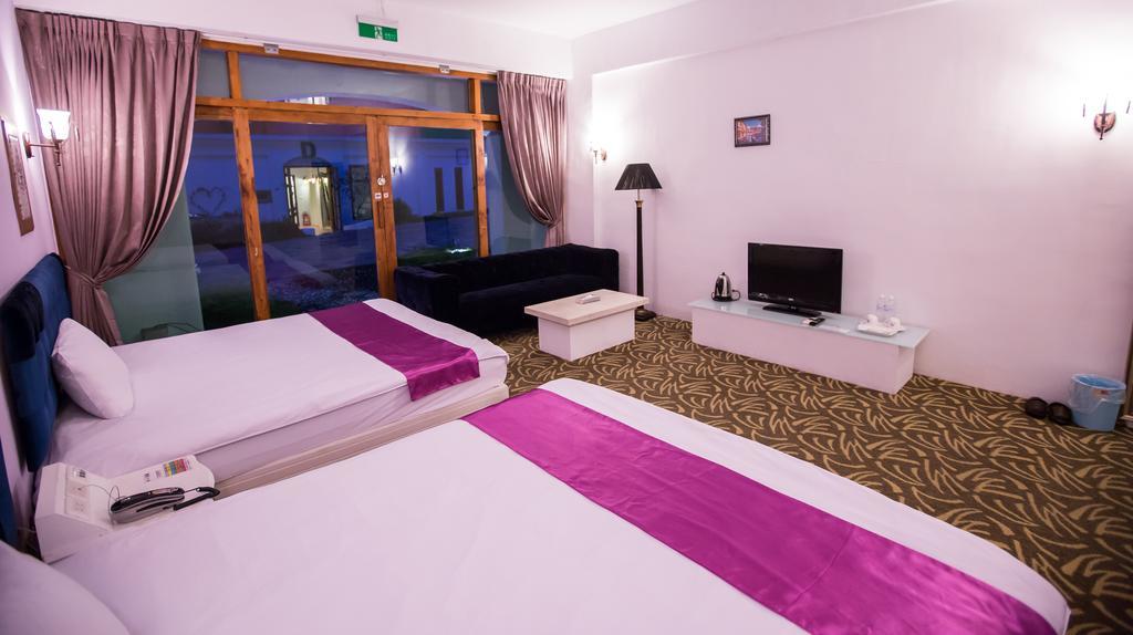 Rainbowtown Hotel Хуалянь Номер фото